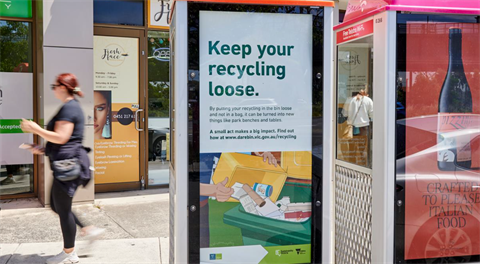 Image of waste and recycling campaign on tram stop