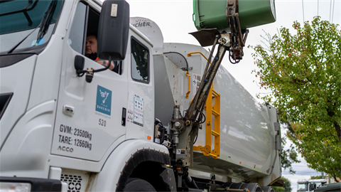 garbage-truck-emptying-bin.png