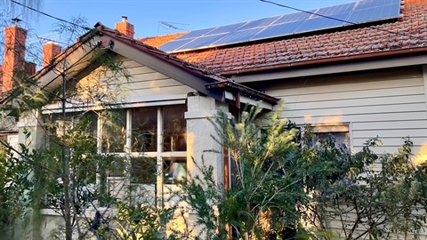 Lisa and Kristies house with solar panels on the roof